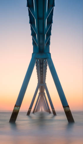 A large metal structure with a bridge on top. Description generated by AI