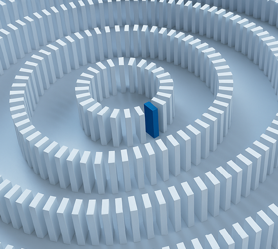 A blue object is in the center of a circle of white blocks. Description generated by AI